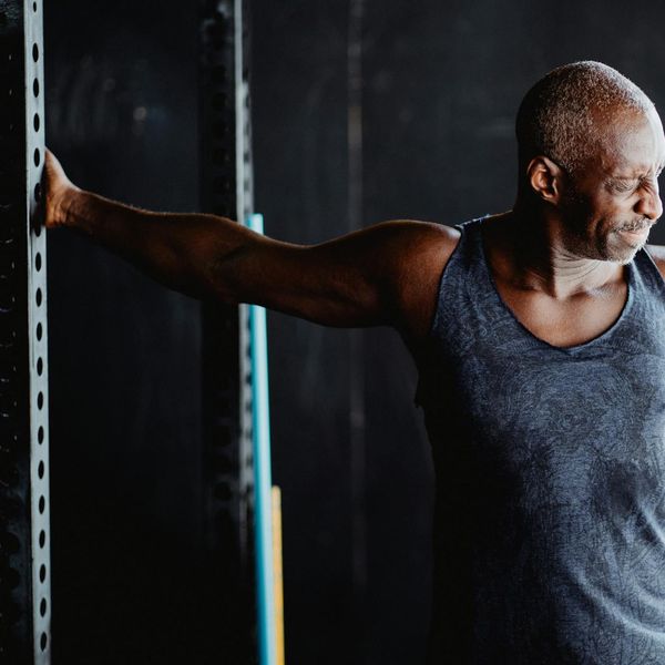 Man stretching his back feeling invigorated and full of energy.